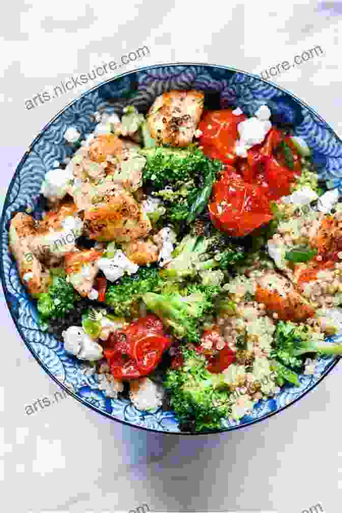 A Photo Of A Bowl Of Grilled Chicken Salad With Quinoa And Vegetables The Vegan Athlete S Cookbook: Protein Rich Recipes To Train Recover And Perform