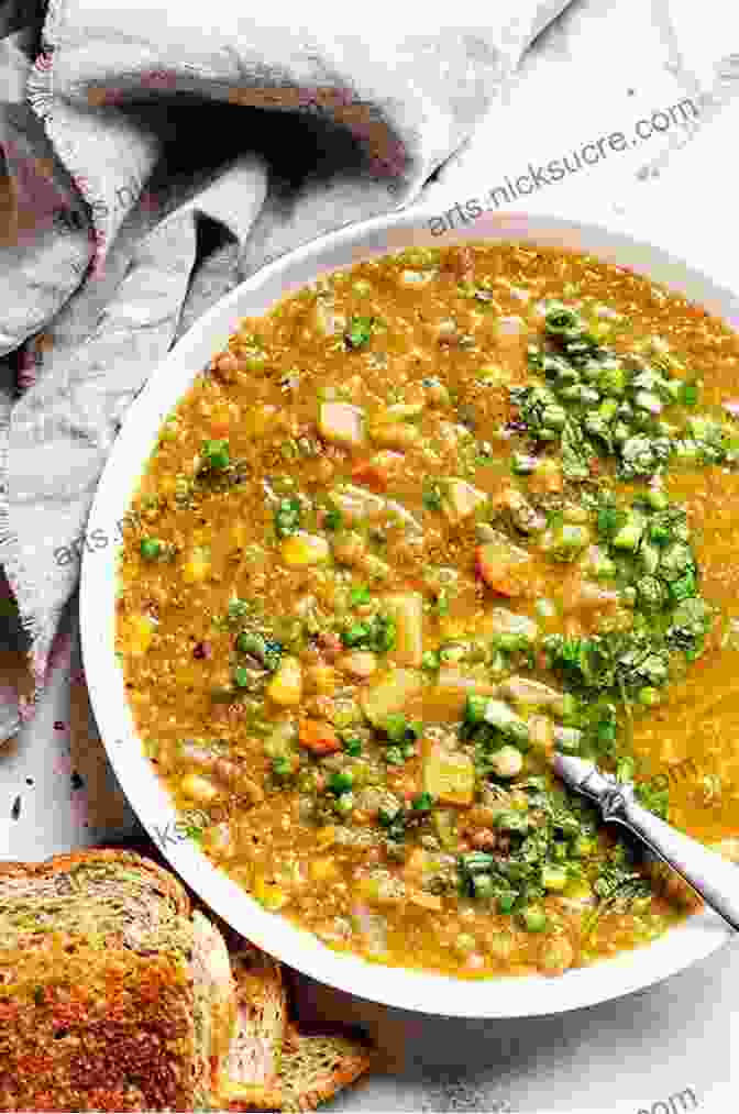 A Photo Of A Bowl Of Lentil Soup With Whole Wheat Bread The Vegan Athlete S Cookbook: Protein Rich Recipes To Train Recover And Perform