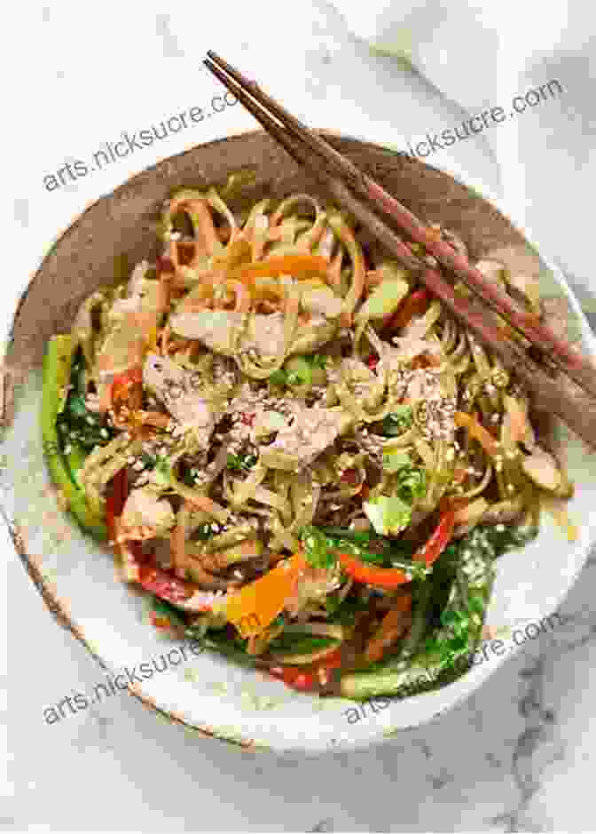 A Photo Of A Chicken Stir Fry With Brown Rice Noodles The Vegan Athlete S Cookbook: Protein Rich Recipes To Train Recover And Perform